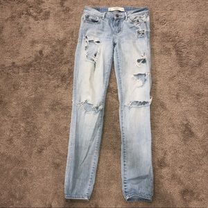 Light-wash distressed Abercrombie jeans.